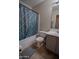 This bathroom features a shower-tub combination and a single sink vanity at 11601 W Bloomfield Rd, El Mirage, AZ 85335