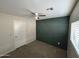 Empty bedroom showcasing clean walls and carpeted flooring at 11601 W Bloomfield Rd, El Mirage, AZ 85335