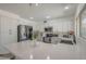 Bright kitchen featuring stainless steel appliances, quartz countertops, and breakfast bar for flexible seating at 12234 S Pewaukee St, Phoenix, AZ 85044