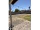 Spacious backyard with a covered patio and ample space for outdoor activities and relaxation at 1319 E Piute Ave, Phoenix, AZ 85024