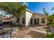 Private backyard featuring a brick patio and ample space for outdoor activities and entertaining at 13864 W Ironwood St, Surprise, AZ 85374