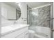 Modern bathroom with a glass-enclosed shower, stylish vanity, and sleek fixtures at 13864 W Ironwood St, Surprise, AZ 85374