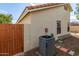 Exterior features air conditioning unit, painted brick and stucco walls at 13864 W Ironwood St, Surprise, AZ 85374