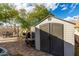 Spacious backyard shed provides ample storage space for tools and equipment at 13864 W Ironwood St, Surprise, AZ 85374