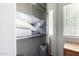 This walk-in closet features wire shelving to hold and store linens and other household items at 13864 W Ironwood St, Surprise, AZ 85374
