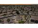 Aerial view of a residential neighborhood and backyard at 14621 W Catalina Dr, Goodyear, AZ 85395