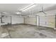 Spacious three-car garage offering ample parking and storage space at 14621 W Catalina Dr, Goodyear, AZ 85395