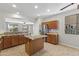 Spacious kitchen with stainless steel appliances, granite countertops and island at 14621 W Catalina Dr, Goodyear, AZ 85395