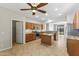 Spacious kitchen with stainless steel appliances and island at 14621 W Catalina Dr, Goodyear, AZ 85395