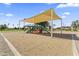 The community playground offers a shaded play area with slides and climbing structures for  at 14621 W Catalina Dr, Goodyear, AZ 85395