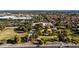 Expansive aerial shot capturing the neighborhood, park amenities, and surrounding landscape at 1521 W Kent Dr, Chandler, AZ 85224