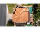 Aerial view of the property showcasing the tile roof, pool, and outdoor living spaces at 1521 W Kent Dr, Chandler, AZ 85224