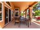 Spacious covered patio with comfortable seating and dining options, ideal for outdoor living at 1521 W Kent Dr, Chandler, AZ 85224