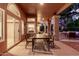 Spacious covered patio with comfortable seating and dining options, ideal for outdoor living at 1521 W Kent Dr, Chandler, AZ 85224