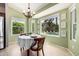 A dining area showcases views of the pool, a chandelier, and decor at 1521 W Kent Dr, Chandler, AZ 85224