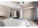 Spacious main bedroom featuring neutral walls, plush carpet, and ample closet space at 1521 W Kent Dr, Chandler, AZ 85224