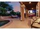 Cozy covered patio with comfortable seating and views of the pool, creating a perfect outdoor retreat at 1521 W Kent Dr, Chandler, AZ 85224