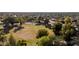 Expansive community park with grassy fields and mature trees at 1521 W Kent Dr, Chandler, AZ 85224