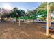 Playground featuring modern swing set on mulch ground cover at 1521 W Kent Dr, Chandler, AZ 85224