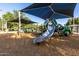 Community playground with a large slide and covered play structures for entertainment at 1521 W Kent Dr, Chandler, AZ 85224