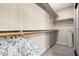 Walk-in closet with lots of shelving space and ample room for storage at 1521 W Kent Dr, Chandler, AZ 85224