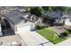 Charming home with a two-car garage, well-manicured front yard, and a welcoming curb appeal at 15537 W Port Royale Ln, Surprise, AZ 85379