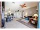 Open-concept living space featuring a kitchen, dining area, and Gathering room with a harmonious flow and modern design at 15537 W Port Royale Ln, Surprise, AZ 85379