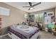 Bright bedroom with a ceiling fan, window with blinds, and carpeted floors at 1723 N Hillcrest --, Mesa, AZ 85201