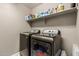 Efficient laundry room equipped with modern washer and dryer units at 1723 N Hillcrest --, Mesa, AZ 85201