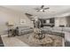 Bright, spacious living room showcasing comfortable gray seating, a coffee table, and an open concept design at 1723 N Hillcrest --, Mesa, AZ 85201