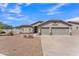 Inviting single-Gathering home with a spacious three-car garage and well-maintained front yard landscaping at 18088 W San Alejandro Dr, Goodyear, AZ 85338