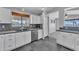 Kitchen with stainless steel appliances, tiled backsplash, and updated cabinetry at 18088 W San Alejandro Dr, Goodyear, AZ 85338