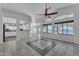 Spacious living room featuring bright windows, high ceilings, and an open layout, perfect for entertaining at 18088 W San Alejandro Dr, Goodyear, AZ 85338