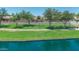 Picturesque lake park offers green spaces, walking paths, and mature trees for enjoying nature at 18088 W San Alejandro Dr, Goodyear, AZ 85338