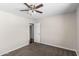 Bedroom features ceiling fan, neutral paint, carpet and new doors at 1911 E Lawrence Rd, Phoenix, AZ 85016