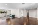 Comfortable living room with hardwood floors, neutral decor, and ample space for entertaining or relaxing at 1911 E Lawrence Rd, Phoenix, AZ 85016