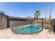 Rear exterior view of pool and backyard with mountain views and desert landscaping at 1911 E Lawrence Rd, Phoenix, AZ 85016