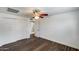 Bedroom features modern ceiling fan, vinyl flooring, closet with bifold doors, and recessed lights at 1930 W Voltaire Ave, Phoenix, AZ 85029