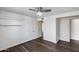 Bedroom features modern ceiling fan, vinyl flooring, and recessed lights at 1930 W Voltaire Ave, Phoenix, AZ 85029