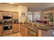 Well-equipped kitchen with stainless steel appliances, ample cabinet space, and a view into the living area at 19777 N 76Th St # 2142, Scottsdale, AZ 85255