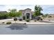Charming single-story home showcasing a low-maintenance desert landscape, mature trees, and inviting entryway at 20258 S 196Th St, Queen Creek, AZ 85142