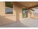 The back patio has lots of natural light and access to the house through sliding glass doors at 21411 W Meadowbrook Ave, Buckeye, AZ 85396