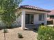 Stylish covered patio area that overlooks a well-maintained yard, perfect for relaxing at 25109 N 173Rd Dr, Surprise, AZ 85387