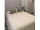 Bedroom features a well-made bed with a large headboard, two pillows, and two nightstands on either side at 25109 N 173Rd Dr, Surprise, AZ 85387