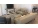Comfortable living space with plush seating, modern decor and media center at 25109 N 173Rd Dr, Surprise, AZ 85387