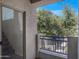 Enjoy outdoor living on this cozy balcony with views of lush greenery and blue skies at 280 S Evergreen Rd # 1296, Tempe, AZ 85288