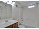 A clean and well-lit bathroom includes a vanity, toilet, and shower/tub combination at 280 S Evergreen Rd # 1296, Tempe, AZ 85288
