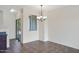 Open dining area with tile floors and a sliding glass door at 280 S Evergreen Rd # 1296, Tempe, AZ 85288