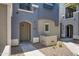 Charming townhome exterior featuring a private entrance and a well-maintained walkway at 280 S Evergreen Rd # 1296, Tempe, AZ 85288