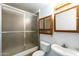 Bathroom features a shower/tub, toilet, medicine cabinet, mirror, and vanity with sink at 3115 N 55Th Ave, Phoenix, AZ 85031